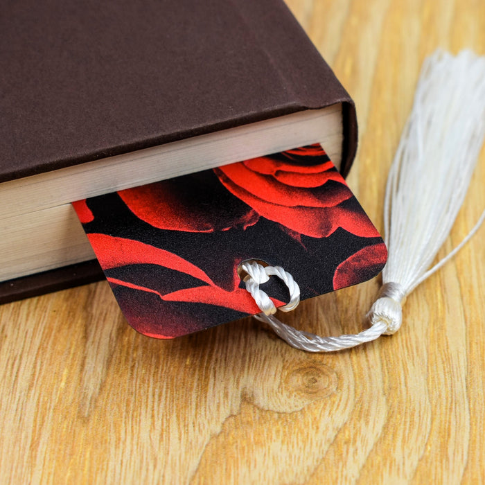 a book with a tassel on top of it